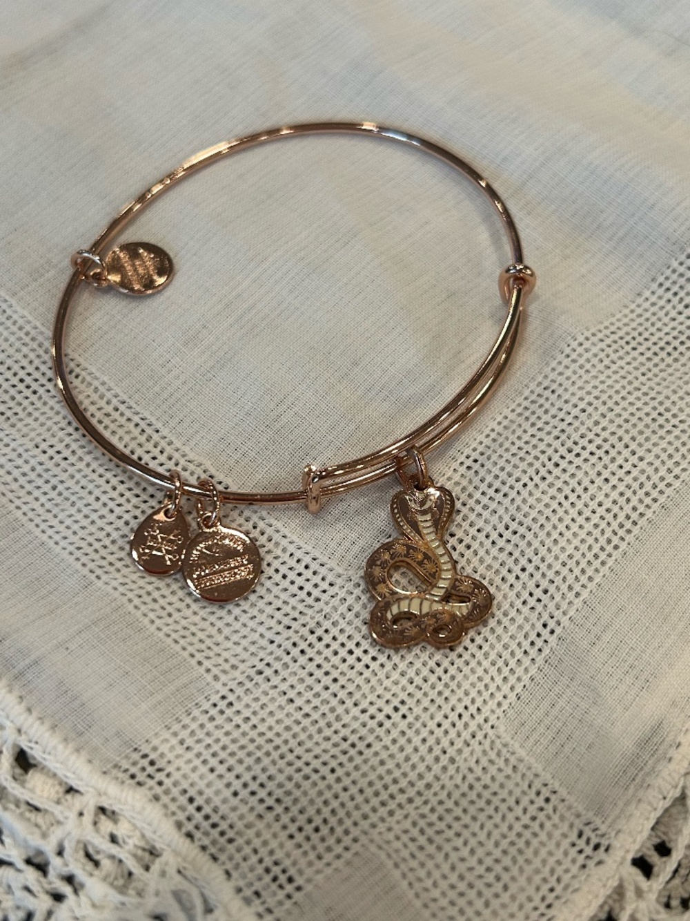 Alex and Ani rose gold bangle bracelet with "cobra" charm